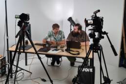 Piotr Werner i Aureliusz Marszałek w studio w trakcie transmisji online